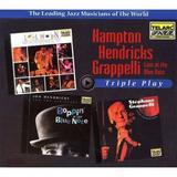 Full performer name: Lionel Hampton & The Golden Men Of Jazz/Jon Hendricks/Stephane Grappelli. Full title: Triple Play: Hampton Hendricks Grappelli Live At The Blue Note. Originally released as three separate albums: LIVE AT THE BLUE NOTE/BOPPIN AT THE...