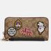 Coach Bags | Disney X Coach Long Zip Around Wallet In Signature Canvas With Patches | Color: Tan | Size: Os