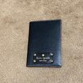 Kate Spade Accessories | Kate Spade Black Wellesley Passport Holder | Color: Black/Gold | Size: Os