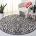 SAFAVIEH Handmade Metro Ismene Animal Print Wool Rug