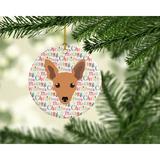 The Holiday Aisle® Miniature Pinscher Merry Christmas Hanging Figurine Ornament Ceramic/Porcelain in Brown/Pink | 2.8 H x 2.8 W x 0.15 D in | Wayfair