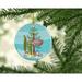 The Holiday Aisle® Dwarf Gourami Merry Christmas Ornament Ceramic/Porcelain in Blue/Green/Red | 2.8 H x 2.8 W x 0.15 D in | Wayfair