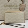 Michael Kors Bags | Michael Kors Jet Set Travel Large Phone Case Wristlet Wallet Mk Natural Multi | Color: Cream/Gold | Size: Large