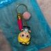 Disney Accessories | 2 For $15 Disney Keychain - Upside Down Alice In Wonderland | Color: Blue/Yellow | Size: Os