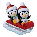 The Holiday Aisle® Penguin Couple on Sled Hanging Figurine Ornament Ceramic/Porcelain in Black/Gray/Red | 3 H x 4 W x 1 D in | Wayfair