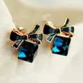 Boucles d'oreilles cube d'eau en cristal bleu pour femmes bijoux de couple arc en pierre boîte