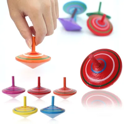 Toupie rotative en bois multicolore pour enfants jouet traditionnel pour bébés