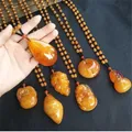 Collier pendentif en ambre de cire d'abeille pour femme collier de bouddha pull perlé style