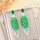 Pera-Boucles d'oreilles pendantes en plumes de tapis vert pour femmes Micro Cubic Full Bijoux de