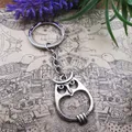 Porte-clés en métal couleur argent pour hommes pendentif hibou creux de 34x24mm porte-clés cadeau