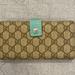 Gucci Bags | Gucci Wallet With Teal Accents | Color: Blue/Brown | Size: Os