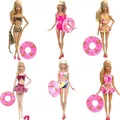 Vêtements de natation pour Barbie beurre 1 x maillot de bain + 1 x bouée de sauvetage aléatoire +