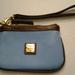 Dooney & Bourke Bags | Dooney And Bourke Pebble Grain Medium Wristlet | Color: Blue/Brown | Size: 4" (H) X .5" (W) X 6" (L)