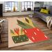 Tan/Green;tan Rectangle 5'11" x 9'2" Area Rug - East Urban Home Rectangle Devizes Machine Made Power Loom Area Rug in Tan/Green 110.0 x 71.0 x 0.16 in green/orange/pink/red | Wayfair