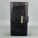 Gucci Accessories | Gucci Monogram Embossed Black Leather Checkbook Wallet | Color: Black | Size: Os