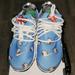 Nike Shoes | Host Pick Hello Kitty Nike Sneakers Mens Size 10/ Womans 12 | Color: Blue/White | Size: 12