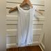 Lululemon Athletica Tops | Lululemon White Tank W Open Back ( To Tie Or Leave Open ) | Color: Tan/White | Size: 4