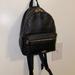 Coach Bags | Coach Mini Charlie Leather Backpack | Color: Black | Size: Os