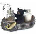 Salt and pepper shaker set bracket Figurine - carved bear fishing bass with net and fishing rod in canoe glass can be refilled and cleaned repeatedly used in kitchens bars restaurants etc.