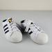 Adidas Shoes | Adidas Women's Superstar Mule 'White Black Gold' | Color: Black/Gold/White | Size: 6