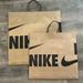 Nike Bags | New Nike Recycled Materials Paper Shopping Bag - Gift Tote - Nike Gift Bag | Color: Brown/Cream | Size: Os