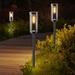 CG INTERNATIONAL TRADING Black Solar Powered Integrated LED Glass/Metal Pathway Light Glass/ in Black/White | 24.6 H x 2.95 W x 2.95 D in | Wayfair