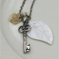 American Eagle Outfitters Jewelry | 3 For 25 American Eagle Leaf Rose Key Necklace | Color: Silver/White | Size: Os