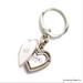 Coach Accessories | Coach Silver Signature White Heart Locket Keychain Purse Charm | Color: Silver/White | Size: Os