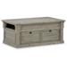 Signature Design by Ashley Moreshire Coffee Table Wood in Brown | 19.75 H x 46 W x 27.5 D in | Wayfair T659-20