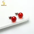 Boucles d'oreilles charmantes en pierre de cornaline rouge pour femmes clous d'oreilles en titane