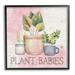 Stupell Industries Plant Babies Potted Sprigs Garden - Floater Frame Graphic Art on Wood in Brown/Green/Pink | 12 H x 12 W x 1.5 D in | Wayfair