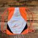 Nike Accessories | Nike Drawstring Backpack | Color: Orange/Silver | Size: One Size