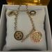 Michael Kors Jewelry | Michael Kors Gold Flip Glitz 4 Charms Bracelet. | Color: Gold | Size: Os