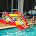 WOW Sports Slide N Smile Inflatable Pool Slide with Sprinklers for Kids and Adults (21-2500-WOW)