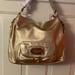 Michael Kors Bags | Michael Kors. Nwot. Purse Beautiful Never Been Used. Not A Spot On It. Pristine | Color: Gold | Size: 16 Inches Wide 12 Inches Tall