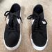 Nike Shoes | Nike Black Canvas Sneakers | Color: Black/White | Size: 6