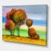 DESIGN ART Designart Orange Autumn Trees During Afternoon Glow Farmhouse Canvas Wall Art Print 44 in. wide x 34 in. high