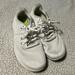 Nike Shoes | Nike Free Runners Platinum White Lace-Up Low Top Running Sneakers Size 8.5 | Color: White | Size: 8.5