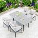 Bayou Breeze Alptekin Rectangular 4 Person 62.99" Aluminum Outdoor Dining Set w/ Cushions Stone/Concrete/Metal in Gray | 62.99 W x 35.43 D in | Wayfair