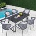 Corrigan Studio® Ranae Rectangular 6 - Person Outdoor Dining Set w/ Cushions Stone/Concrete in Black/Gray | 62.99 W x 35.43 D in | Wayfair