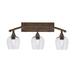 Longshore Tides Aranya 3 - Light Dimmable Vanity Light, Glass in Brown | 12.25 H x 27.5 W x 9 D in | Wayfair 00038E24617D456D8DD3D8882DE84BA9