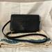 Tory Burch Bags | Black Tory Burch Clutch With Strap Includes Dust Bag | Color: Black | Size: Os