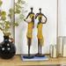 Langley Street® Leaman 2 Piece African Woman Statue Set, Rubber in Black/Yellow | 24.05 H x 6.2 W x 5.3 D in | Wayfair