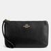 Coach Bags | Coach Large Wristlet - Black/Gold | Color: Black/Gold | Size: Os