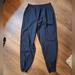 Nike Pants & Jumpsuits | 90's Nike Pleat Front Swishy Track Pants Xxl Black | Color: Black | Size: Xxl
