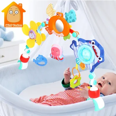 Hochet musical en arc pour poussette de bébé de 0 à 12 mois clip réglable mobile clochette