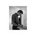 Clint Eastwood Writing on Paper at Home - Unframed Photograph Paper in Black/Gray/White Globe Photos Entertainment & Media | Wayfair 4823998_810