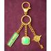 Feng Shui Import Gem Wednesday Talisman Key Chain in Green/Yellow | 4 H x 2 W x 1 D in | Wayfair 3089