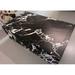 Orren Ellis Madianna Coffee Table, Synthetic in Black | 11.8 H x 39.5 W x 23.5 D in | Wayfair 6A6E693159E14B319C7300A81EB519B9