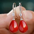 Boucles d'oreilles pendantes en argent exquis pour femmes boucles d'oreilles rondes rouges et